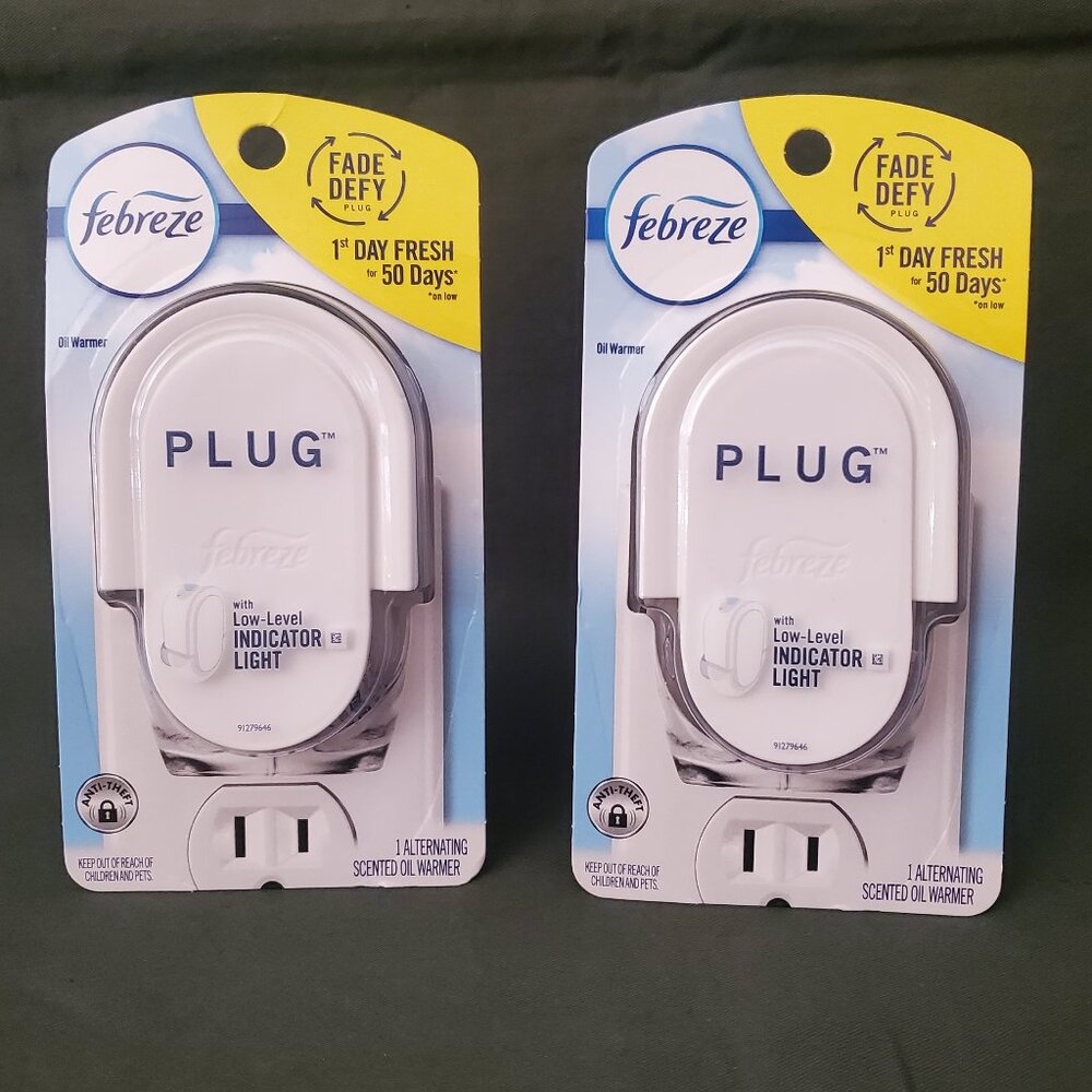 2 Febreze Plug Warner Fade Defy